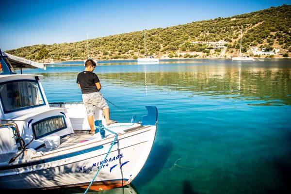Kid on a fisherman's boat