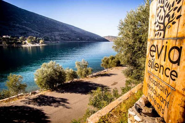 Evia Silence sign showing the sea