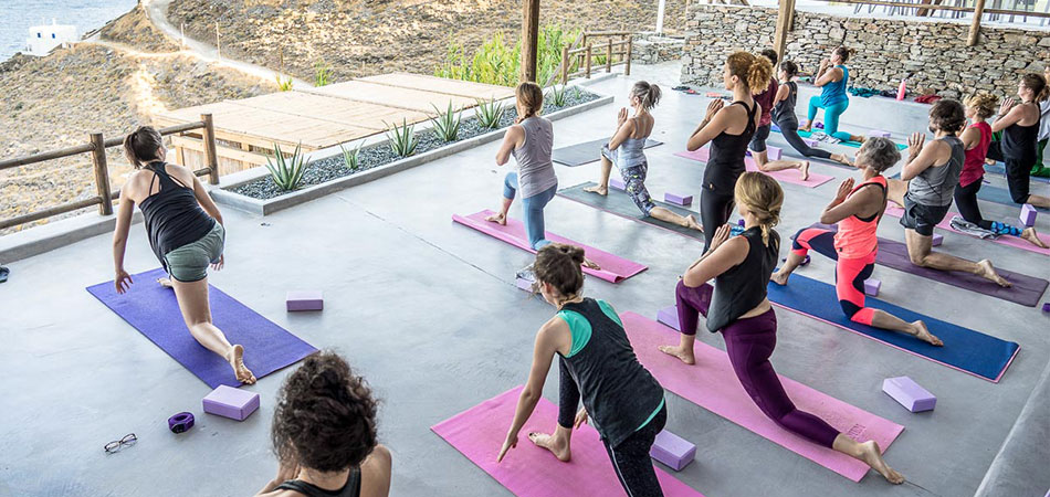 Joanna and students in open space shala