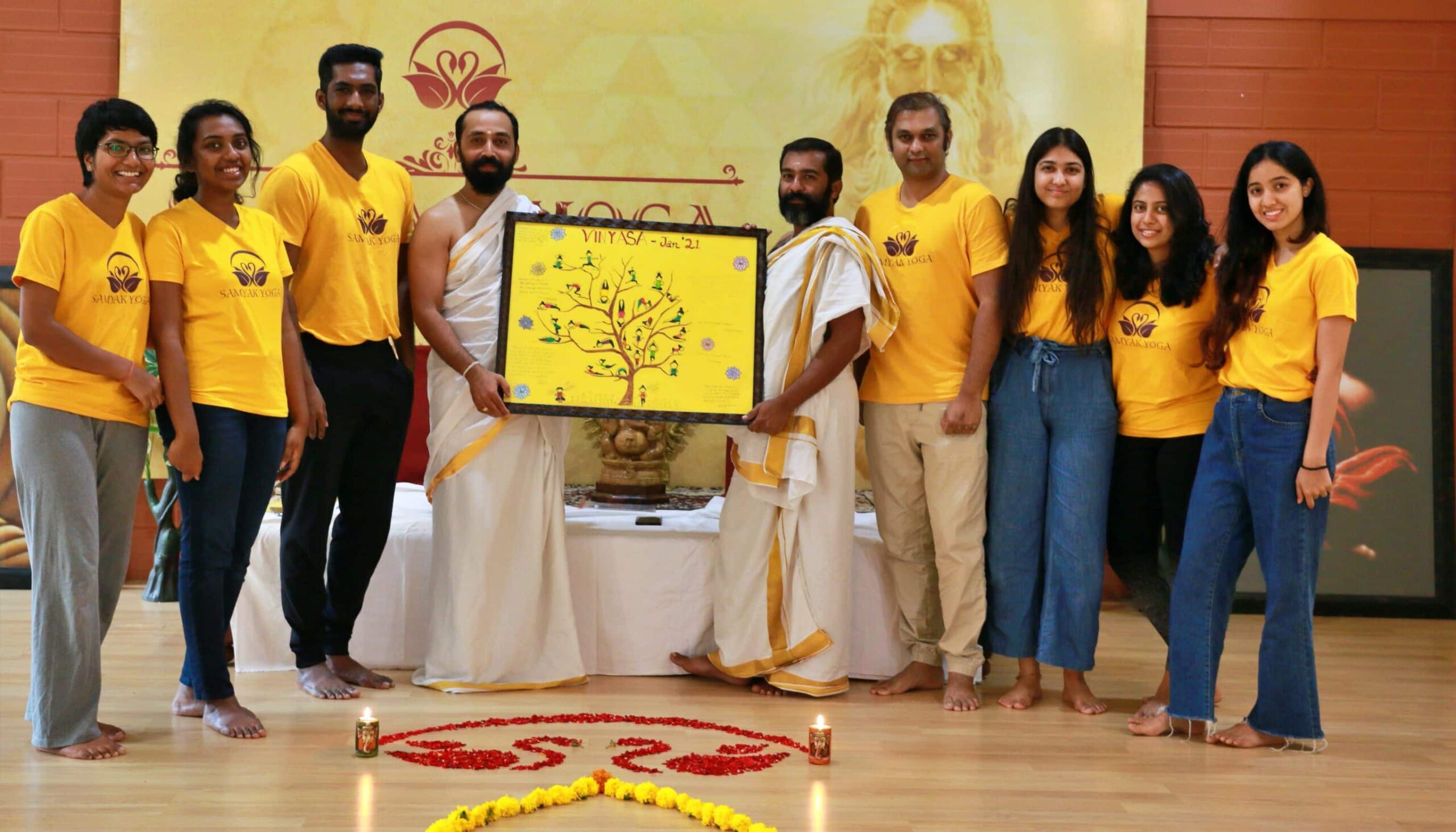 Samyak Yoga School taking a celebratory photo at their yoga teacher training school