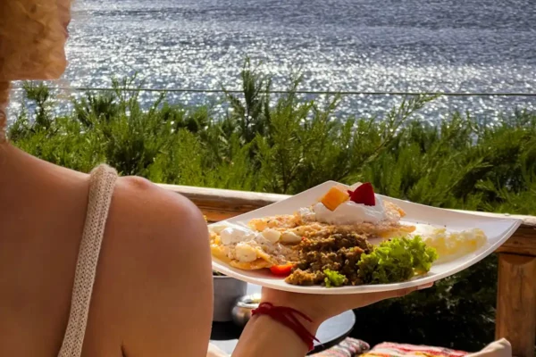 Photo_1 (1) Yummy breakfast food served oceanside during a yoga teacher training with Alpha Yoga School on Evia Island, Greece.