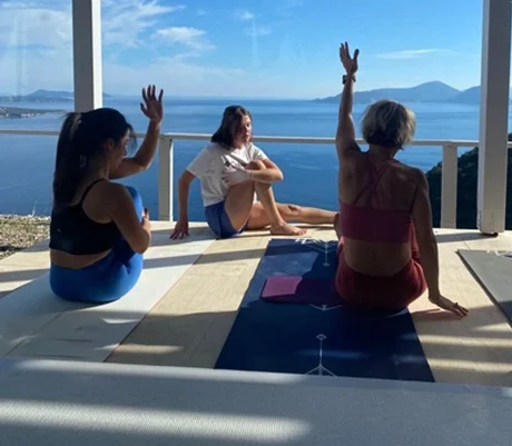 students teach yoga to their fellow students during yoga course